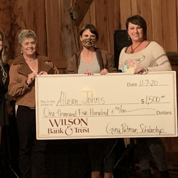 AlisonJohns receiving check